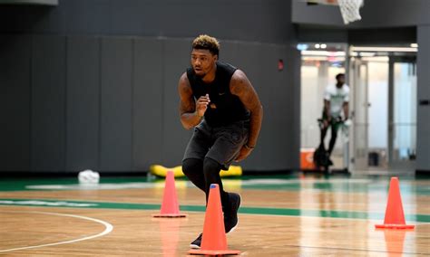 Marcus Smart sets social media ablaze wearing Versace robe to 